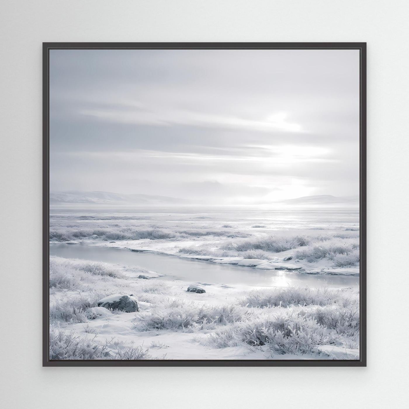 Leinwandbild mit verschneiter Winterlandschaft, schwarz gerahmt