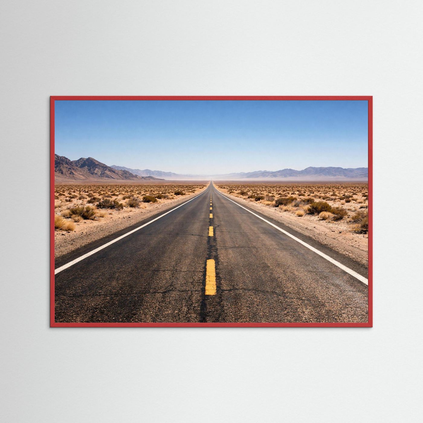 Poster mit roter Holzrahmung, Blick auf gerade Wüstenstraße