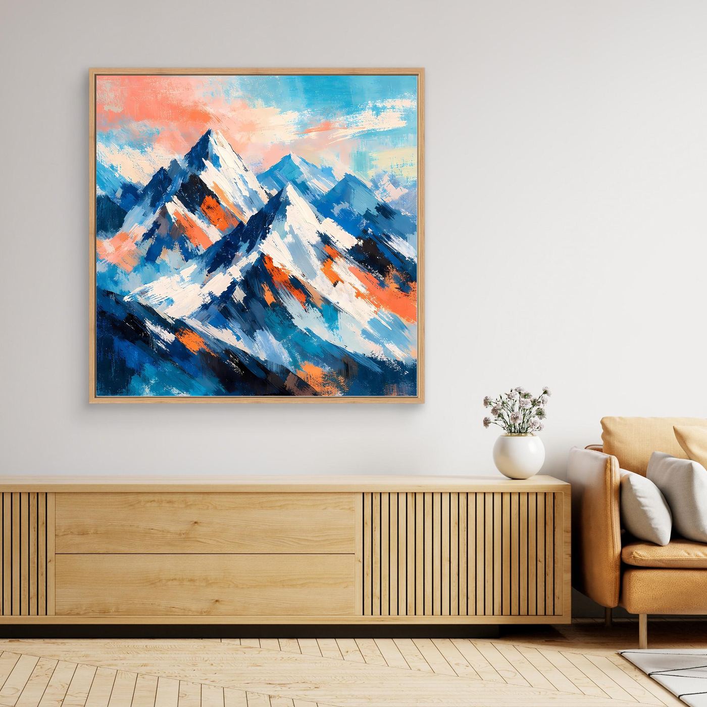 Gerahmtes Leinwand-Wandbild mit impressionistischen Schneebergen in Blau- und Orangetönen