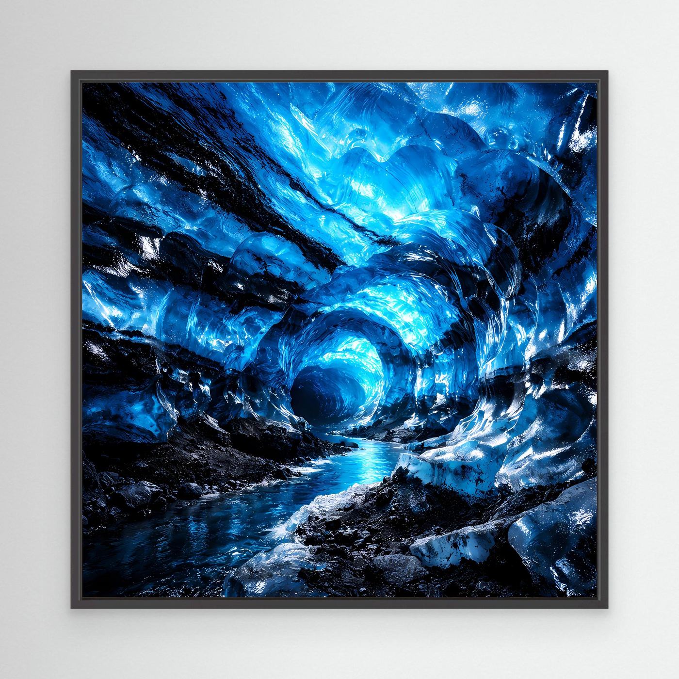 Leinwandbild Blaue Eishöhle mit Eisgrotte und blauem Licht, mit schwarzem Rahmen
