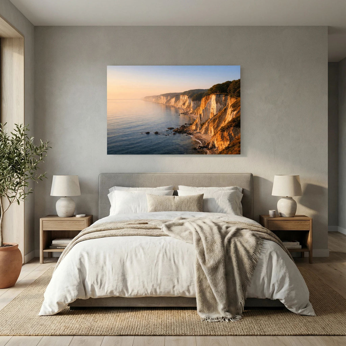 Wandbild im Querformat mit Klippenküste, Meer und goldenem Morgenhimmel