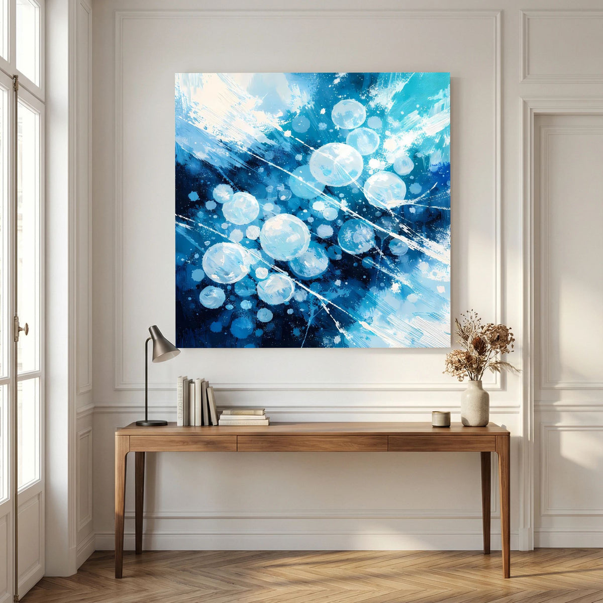 Abstraktes Wandbild auf Leinwand: blaue Eiskreise, helle Sprenkel und Strahlen