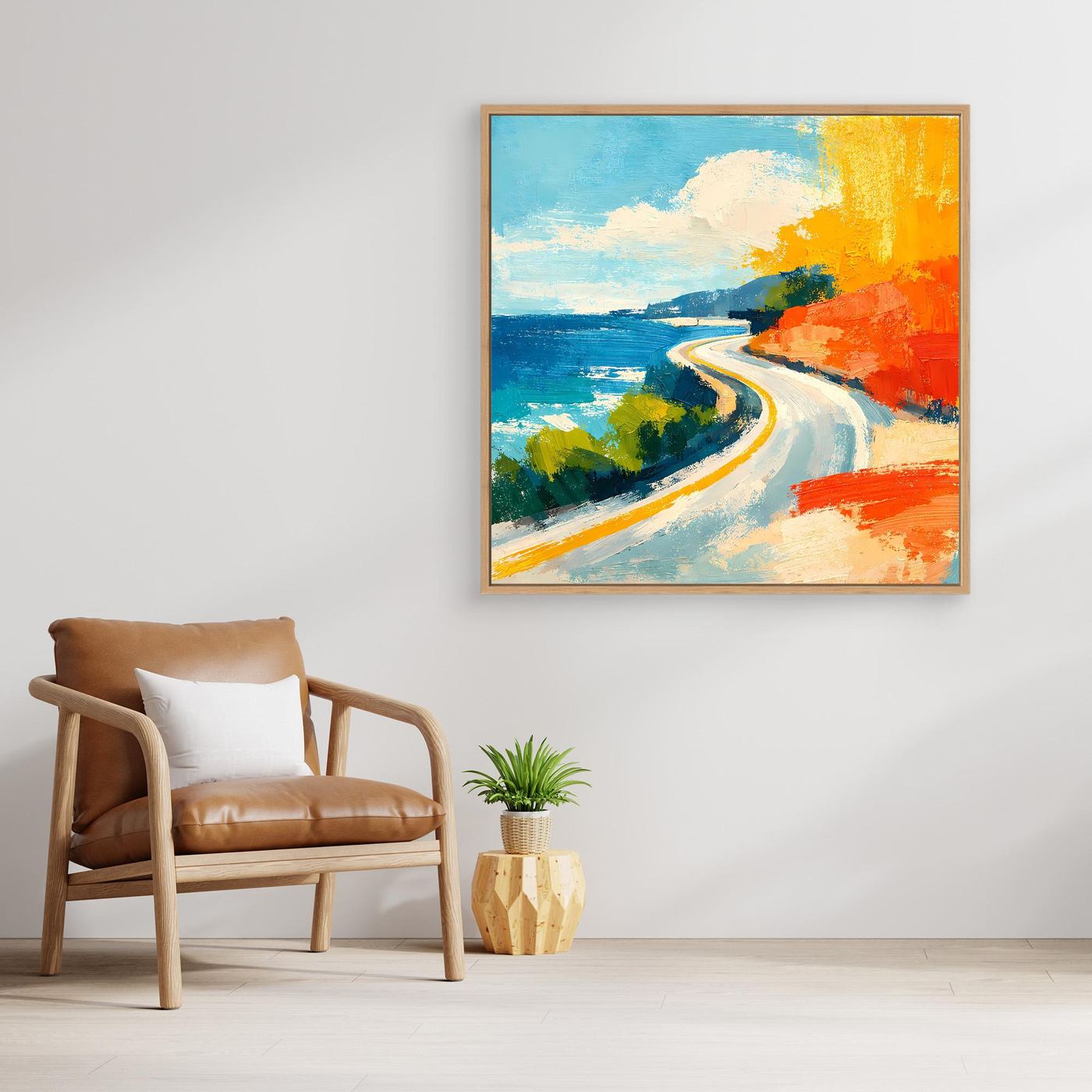 Coastal road abstract wall art with oak frame, blue sea and orange coast with winding road.