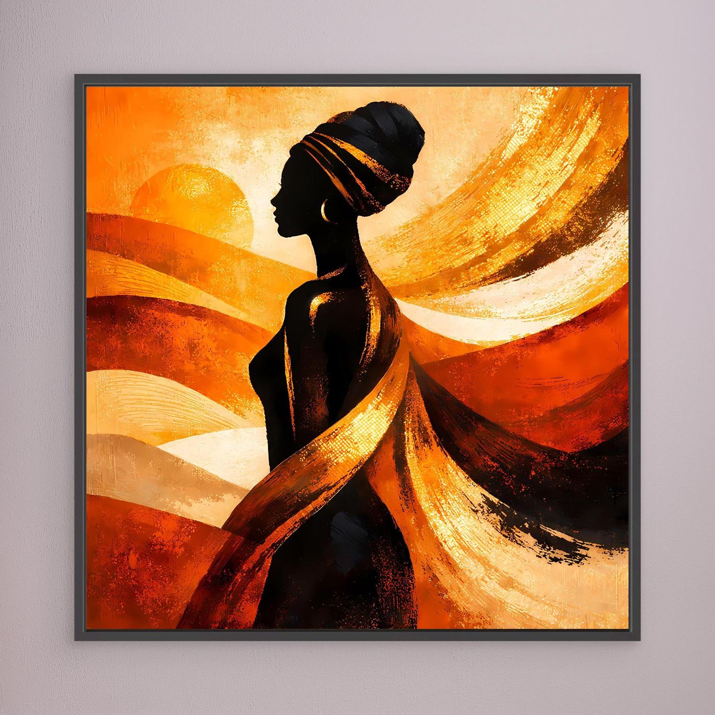 Gerahmtes Leinwandbild mit Silhouette afrikanischer Frau, warmes Orange-Gold, anthrazitfarbener Rahmen.
