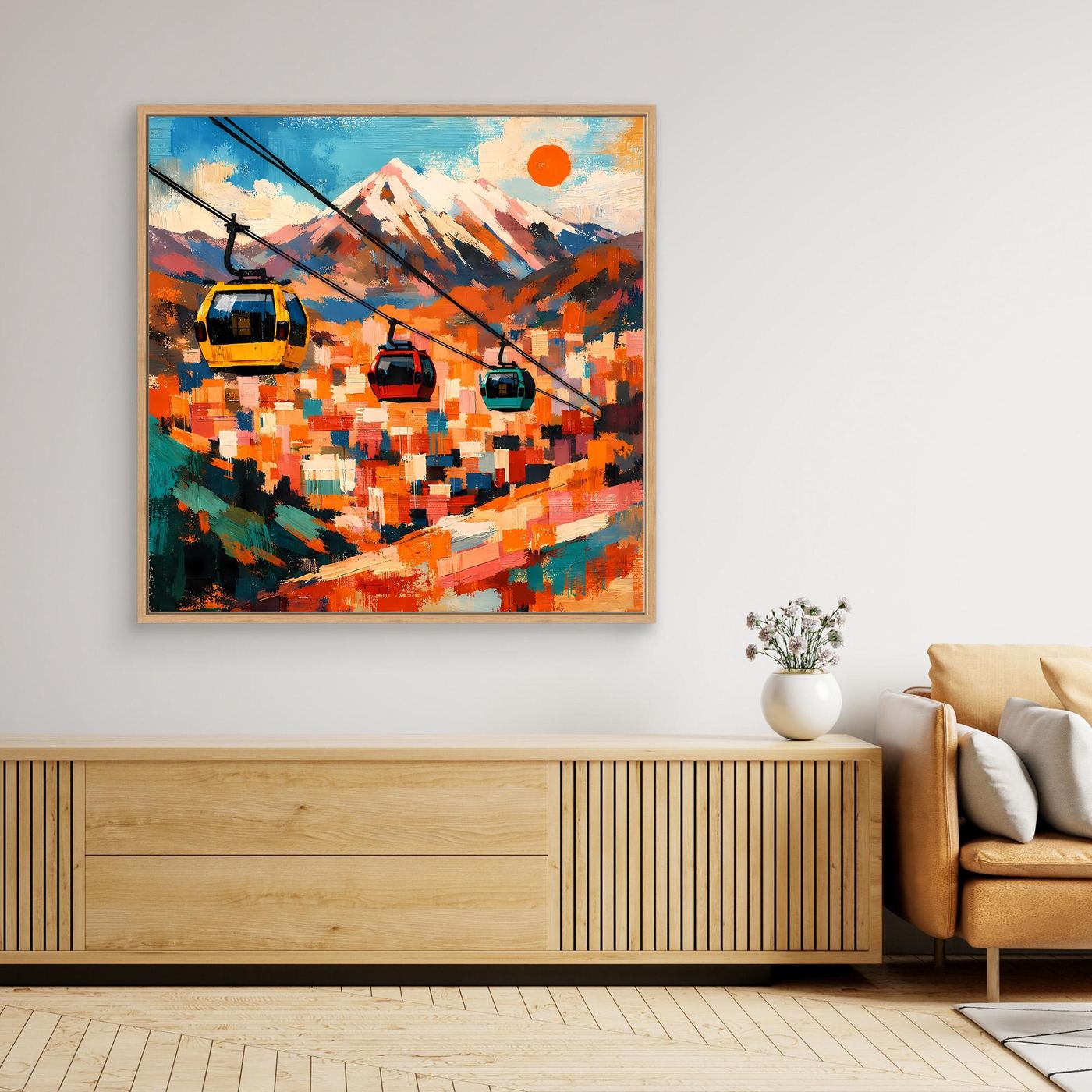 Abstraktes Wandbild mit Seilbahn und Berglandschaft in bunten Farbfeldern, goldener Rahmen