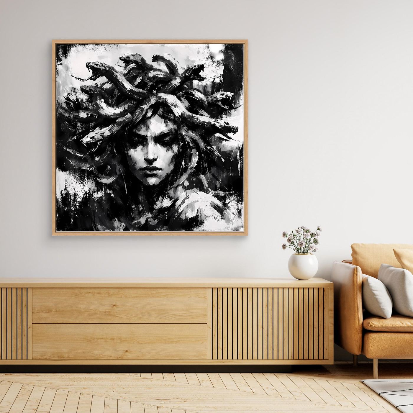 Abstract Medusa canvas wall art with light wood frame, black-and-white face and hair