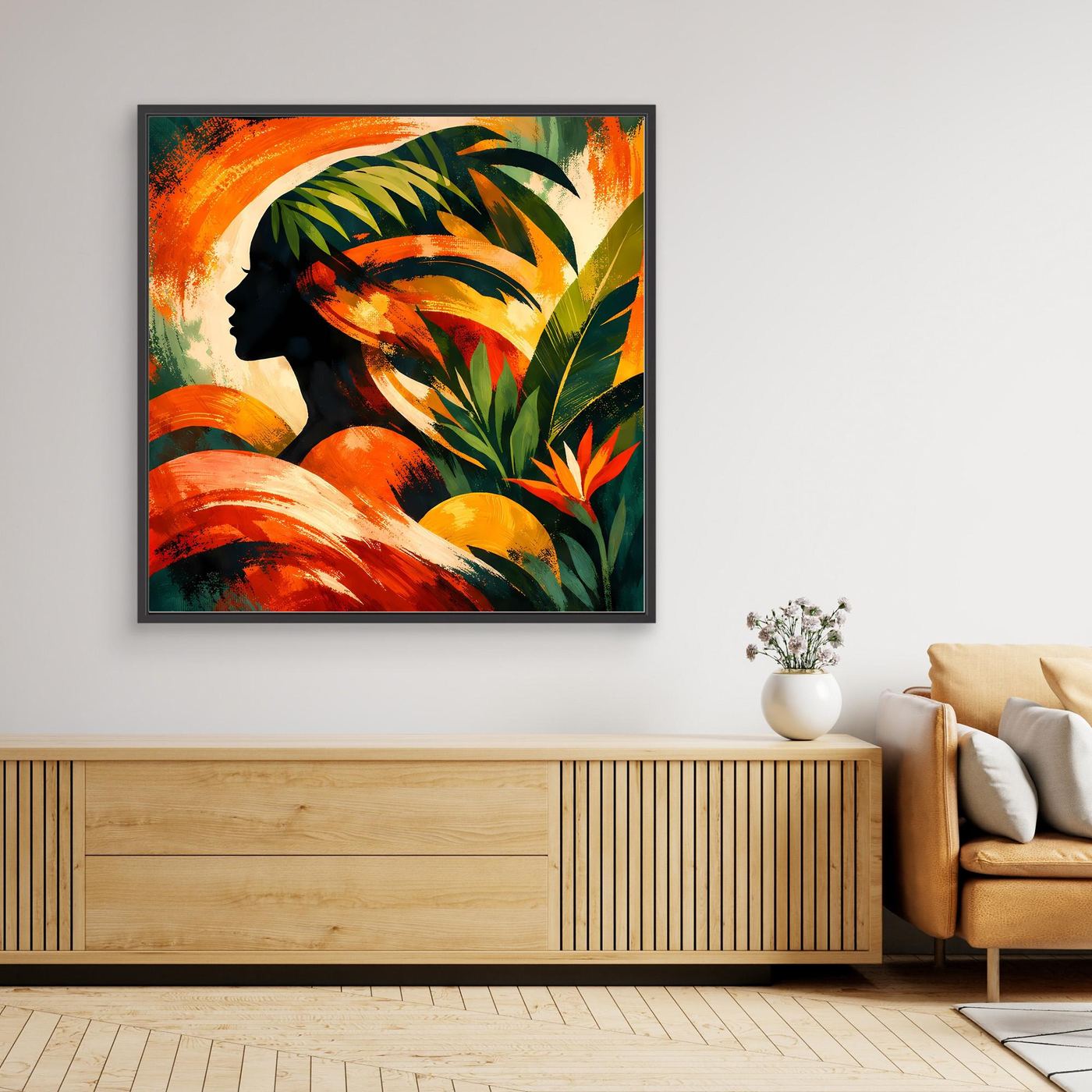 Leinwandbild mit Profil-Silhouette einer Frau, tropische Blätter, orange-rote Farben, schwarzer Rahmen