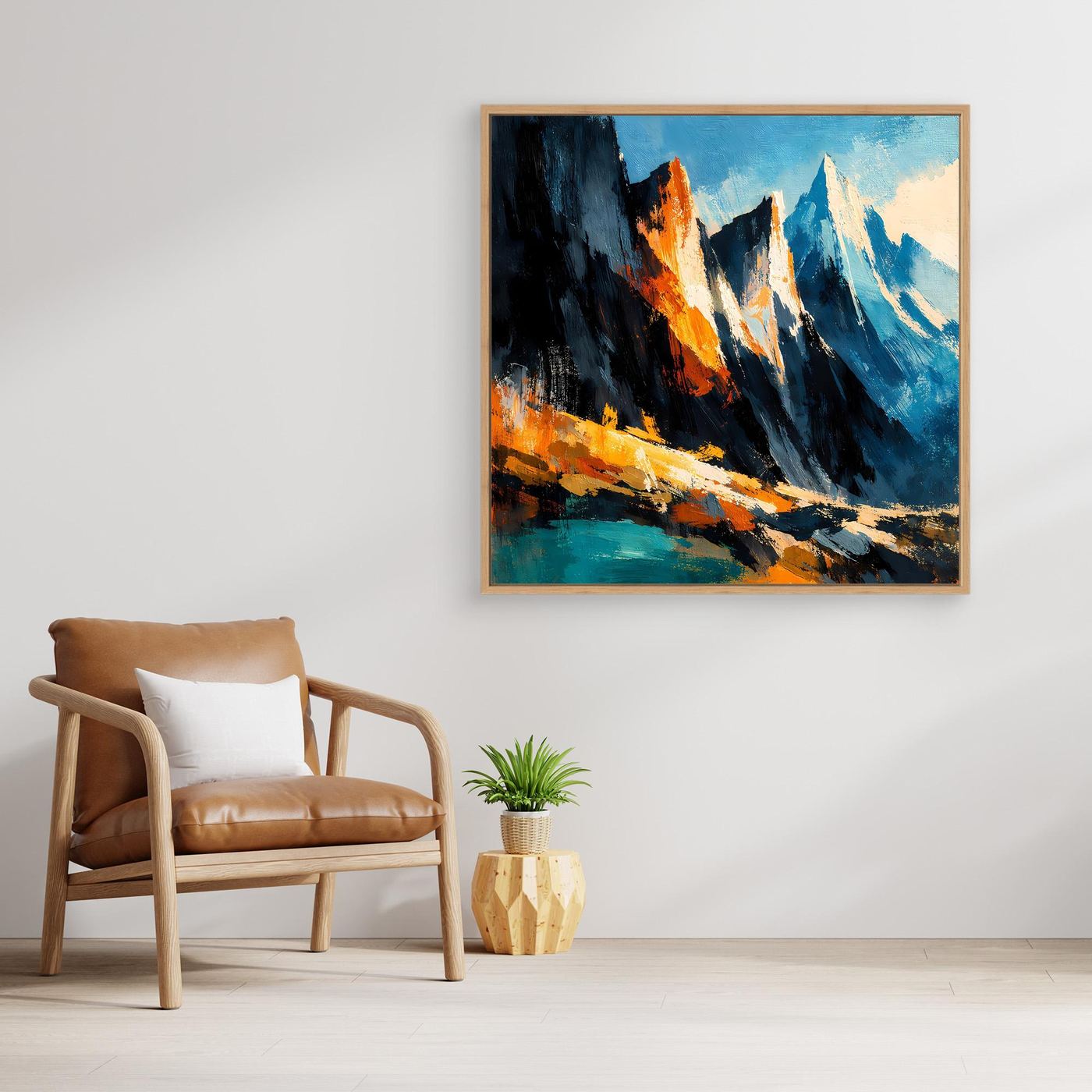 Abstraktes Wandbild mit Bergspitzen in Blau, Türkis und Orange, mit hellem Holzrahmen