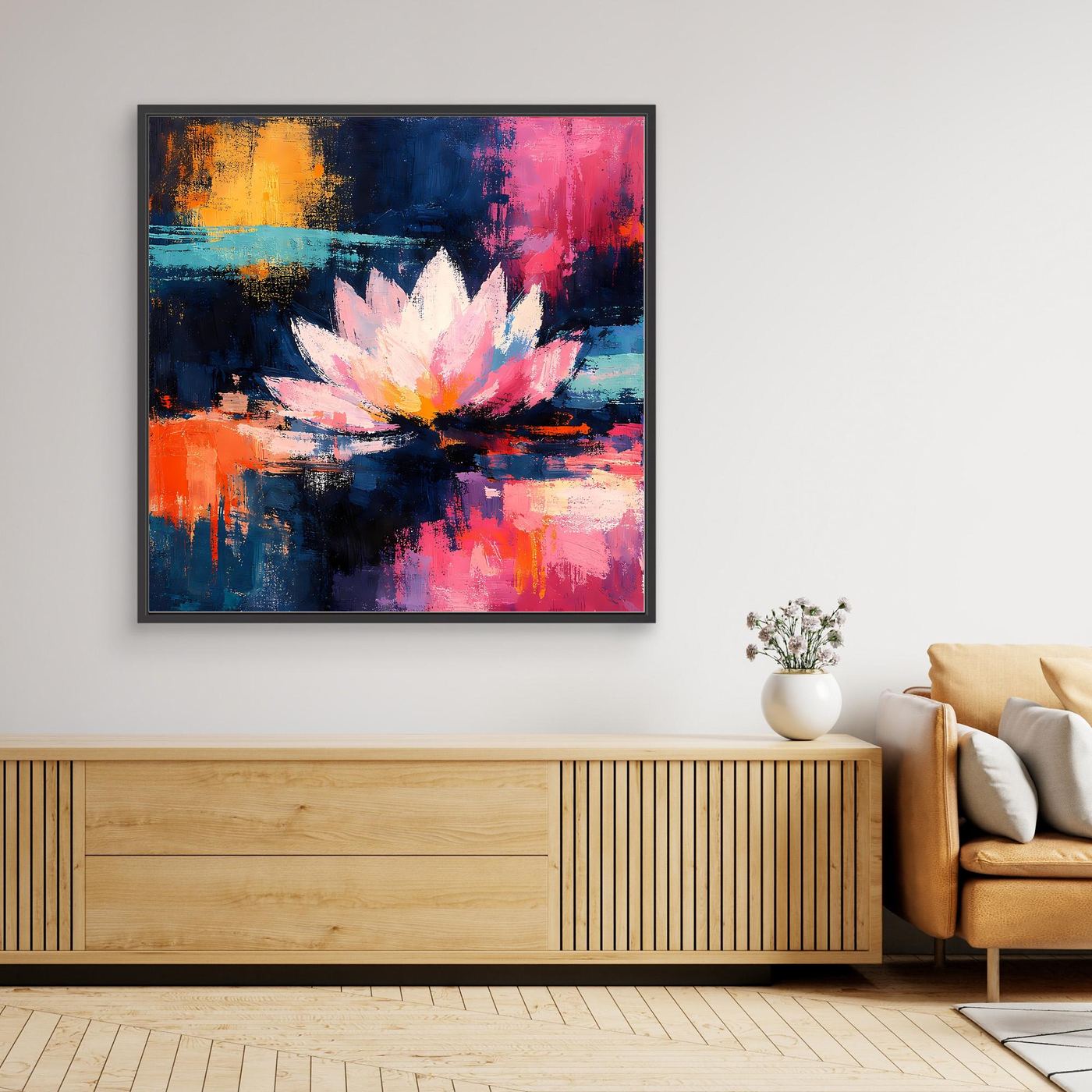 Quadratisches Leinwand-Wandbild mit leuchtender Lotusblüte und Farbflächen, schwarzer Rahmen