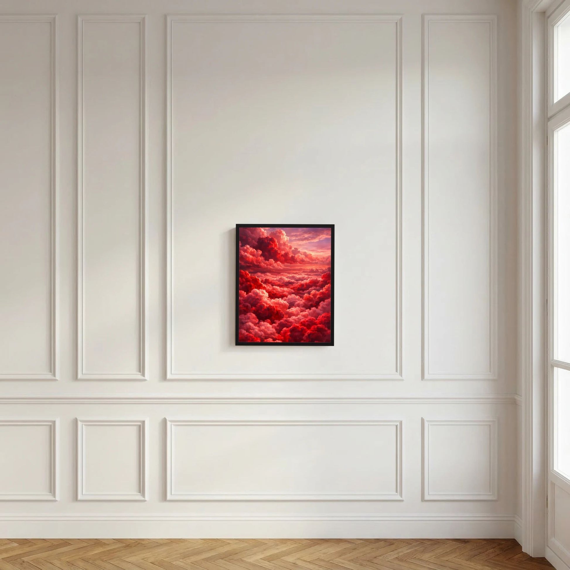 Kleines, gerahmtes Kunstposter mit roten Wolken und rosa Himmel, schwarzer Rahmen.