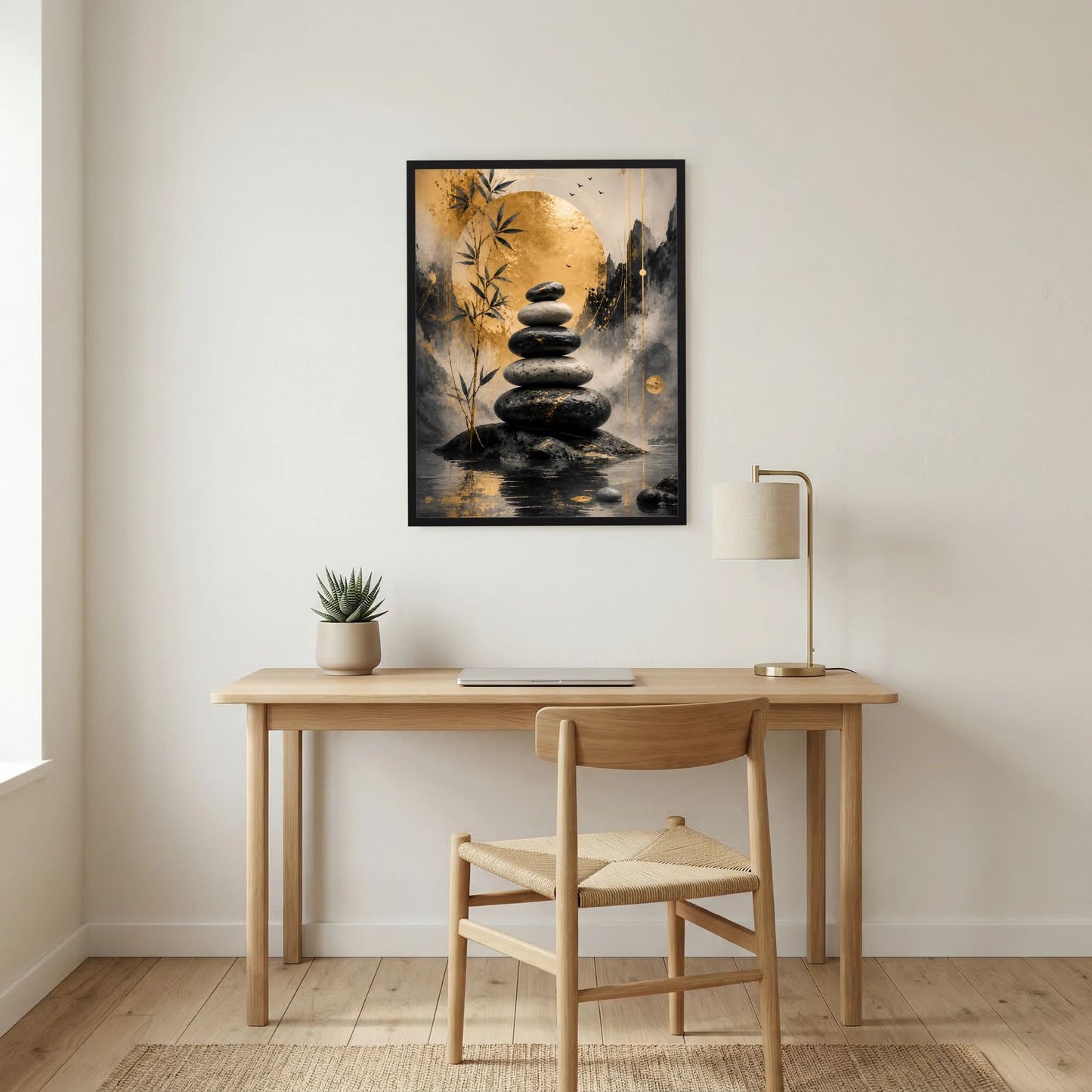 Abstraktes Zen-Poster mit schwarzem Rahmen: Steinbalance vor goldenen Bambusblättern.