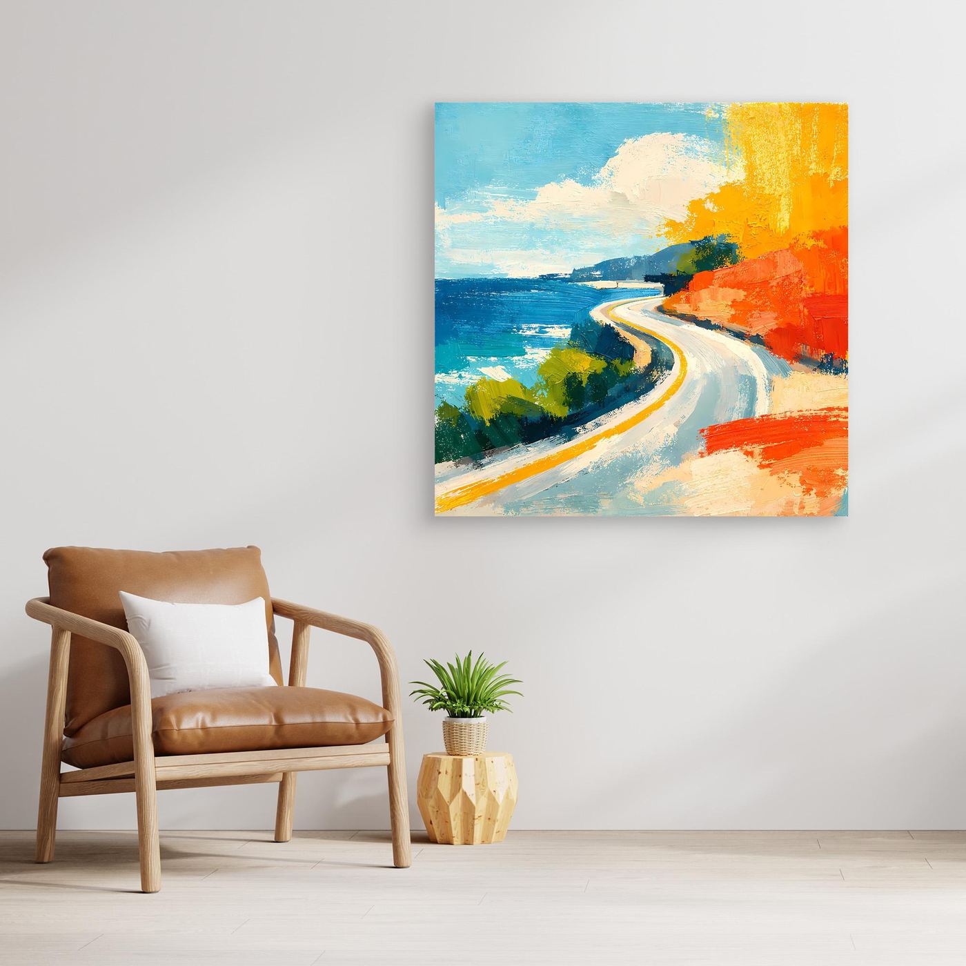 Unframed coastal road abstract wall art with blue water, orange coast, and winding white road.