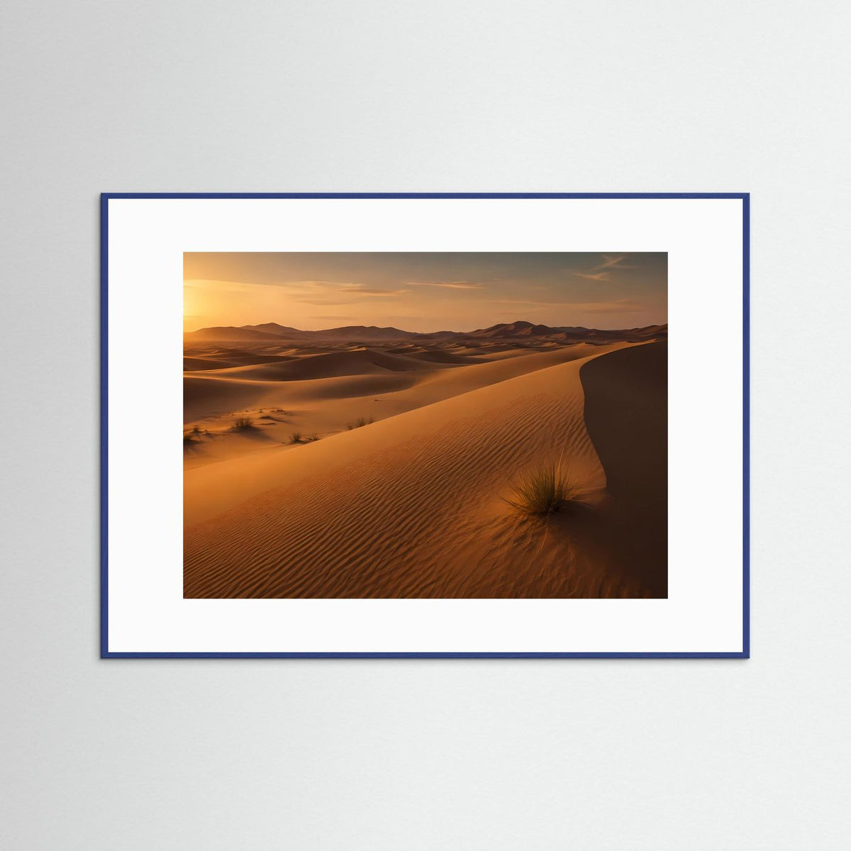 Poster im Querformat mit goldenen Sanddünen im Sonnenuntergang, blau gerahmt.