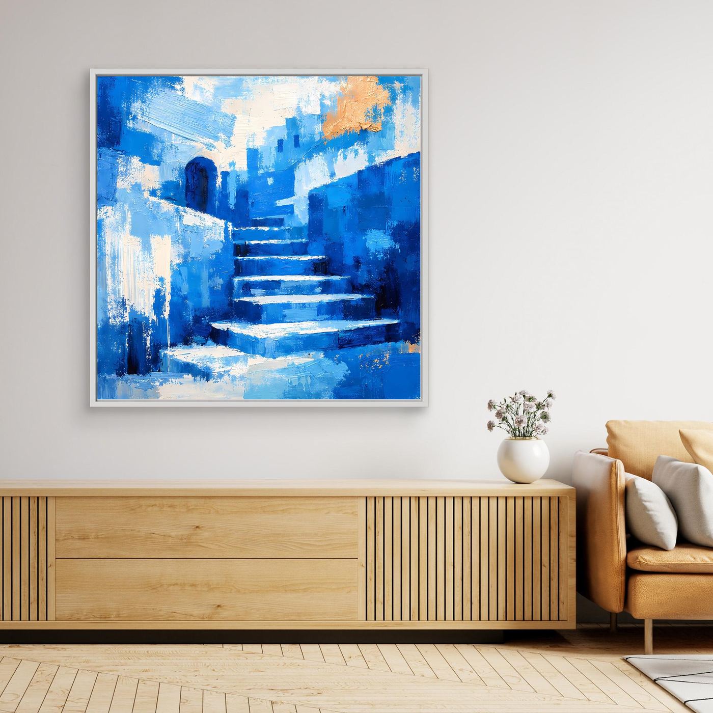 Gerahmtes Wandbild mit abstraktem Gassenmotiv in Blau und Treppenoptik, weißer Rahmen