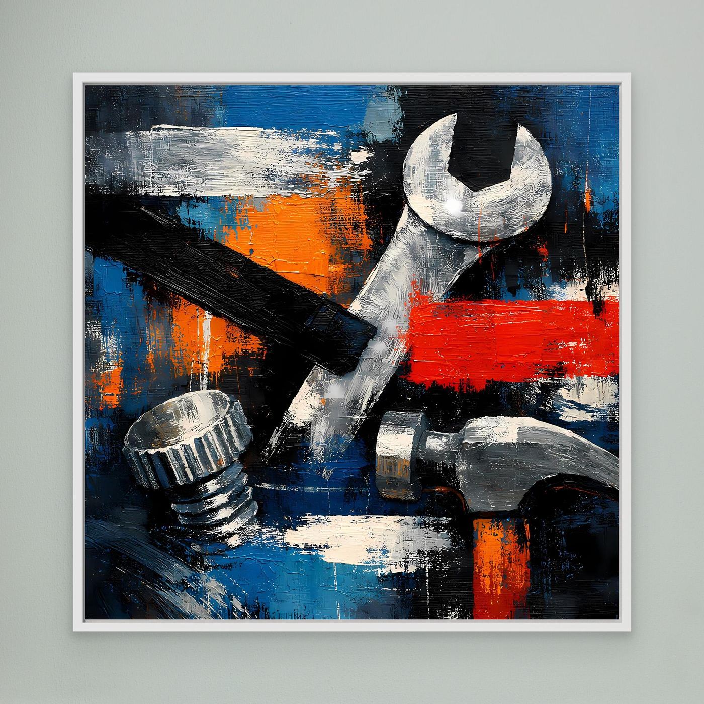 Framed abstract tool wall art canvas with wrench and tools in blue, orange, red.