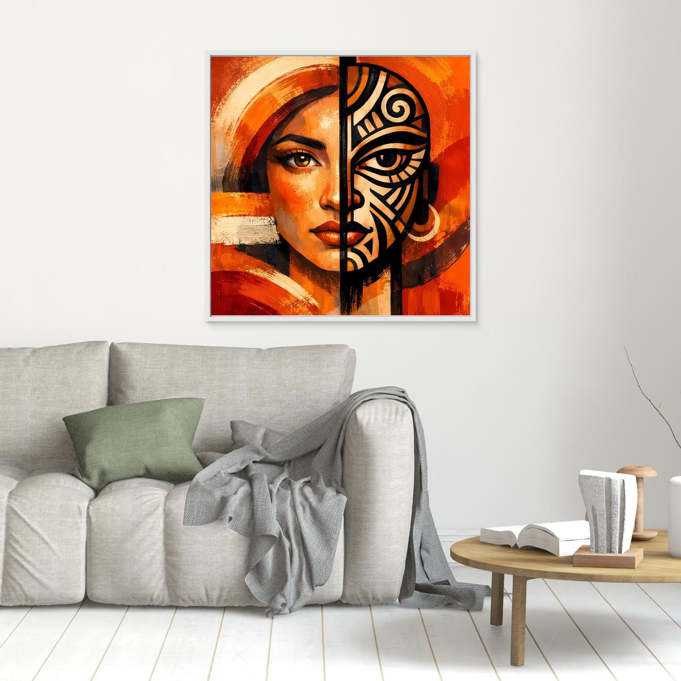 Kleines Leinwandbild mit Frauenporträt und schwarzer Maskenhälfte, orangefarbig, weiß gerahmt.