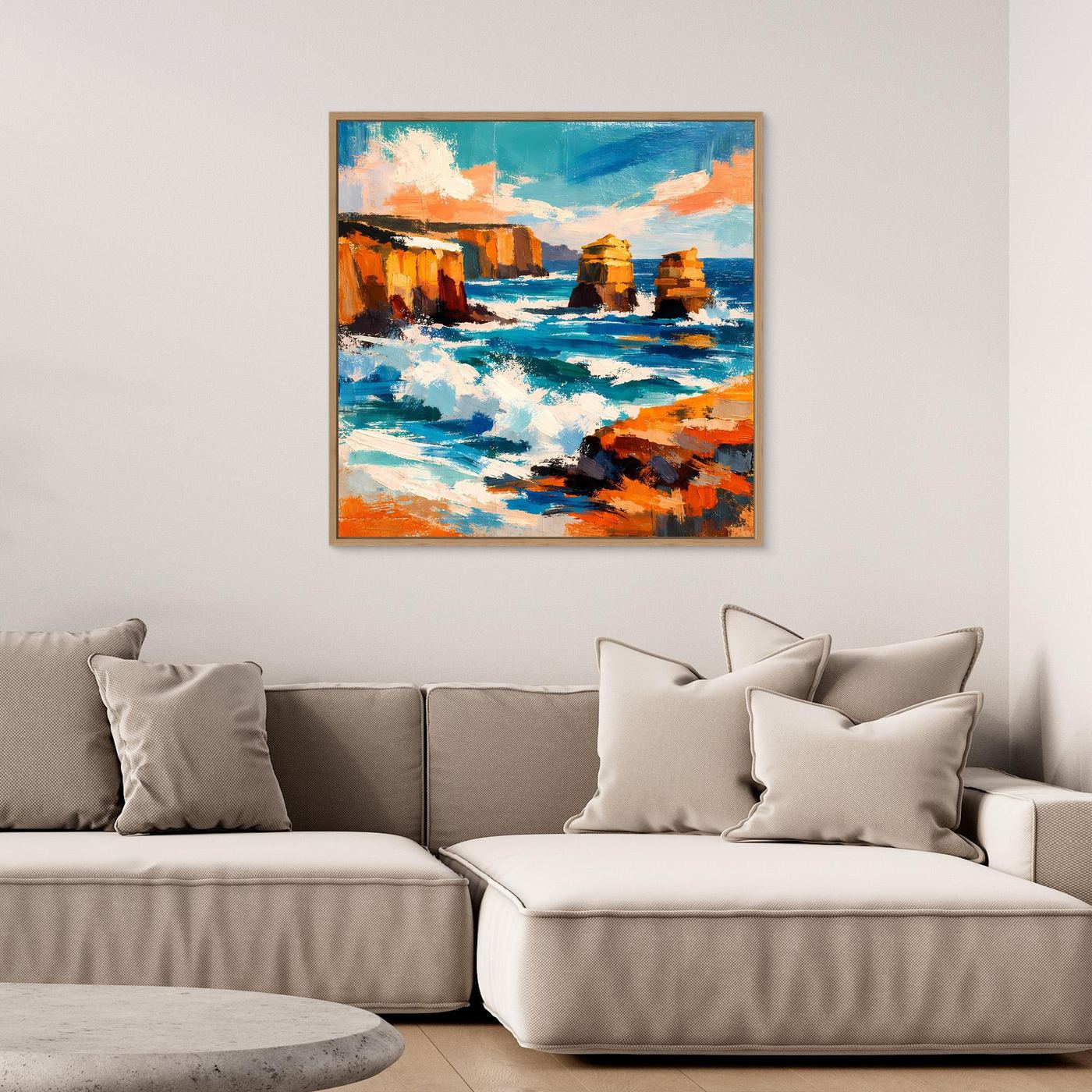 Wandbild mit abstraktem Küstenmotiv, türkis/blau und Orange, mit hellem Holzrahmen