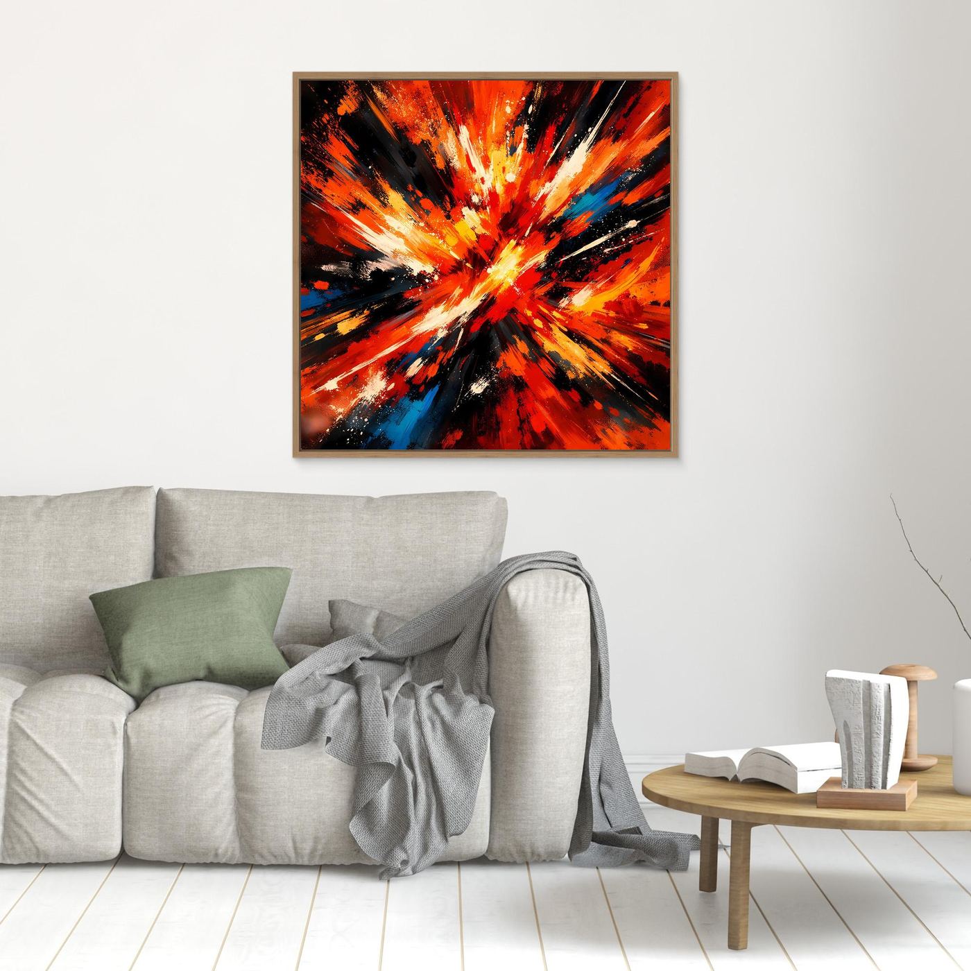 Abstraktes Leinwandbild mit Farbexplosion in Orange, Rot und schwarzen Strahlen, mit dünnem braunem Rahmen.