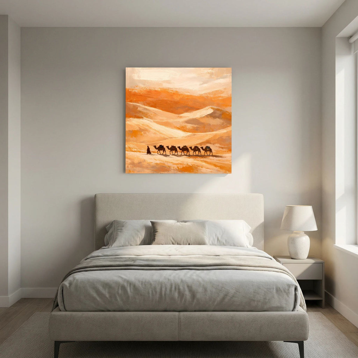Leinwandbild mit Kamelkarawane in Orange-Beige, Holzrahmen an der Wand über dem Bett