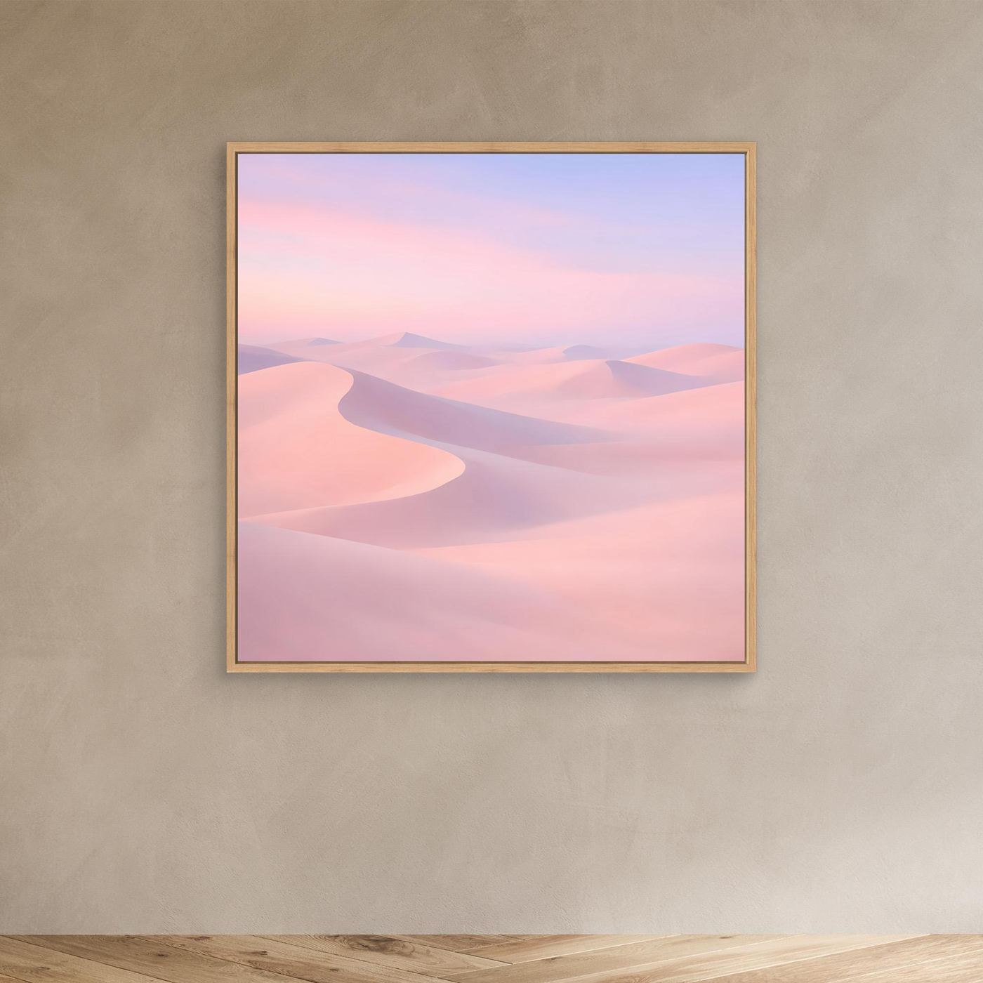 Leinwandbild mit pastellfarbenen Wüstendünen in Rosa und Violett, mit hellem Holzrahmen