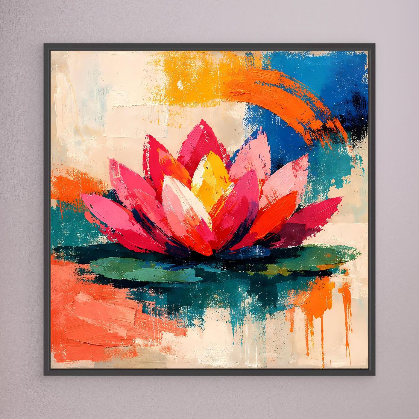 Black-framed abstract lotus wall art with pink petals, yellow center, and orange and blue paint splashes