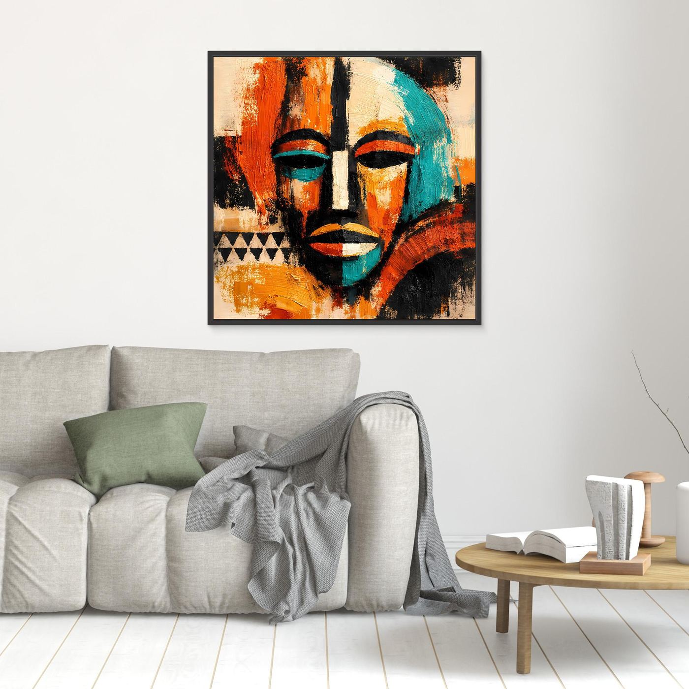 Framed abstract mask portrait wall art with teal and orange face painting and black details.