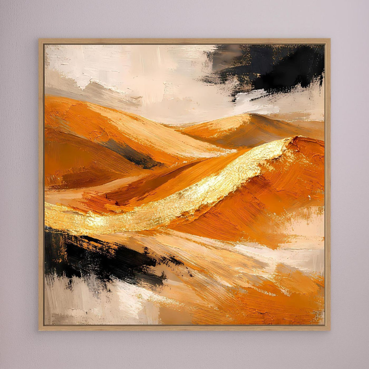 Leinwandbild mit abstrakter Dünenlandschaft in Gold und Orange, goldfarbener Holzrahmen, Schwarz.