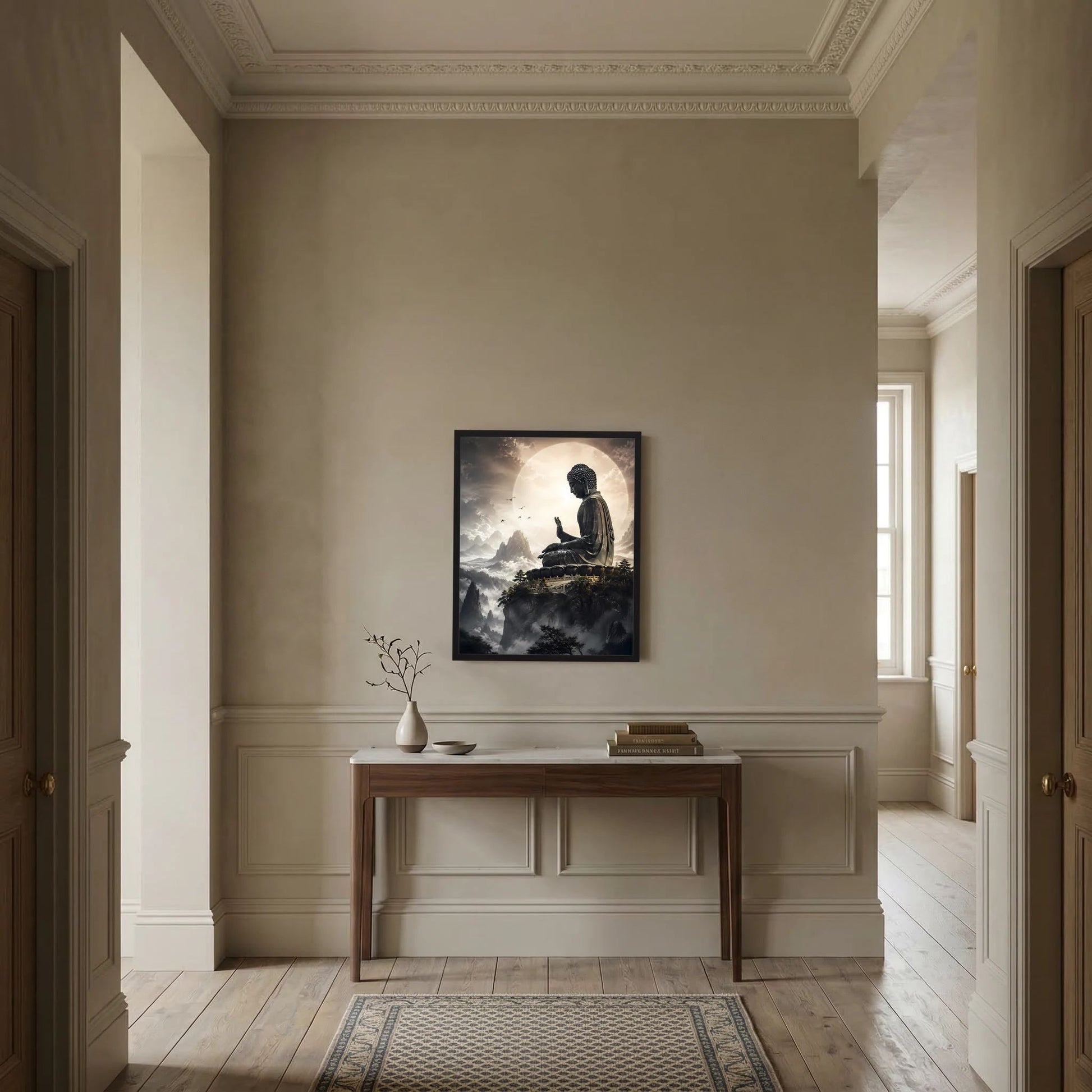 Wandposter im schwarzen Rahmen mit sitzendem Buddha über Berglandschaft und Wolken