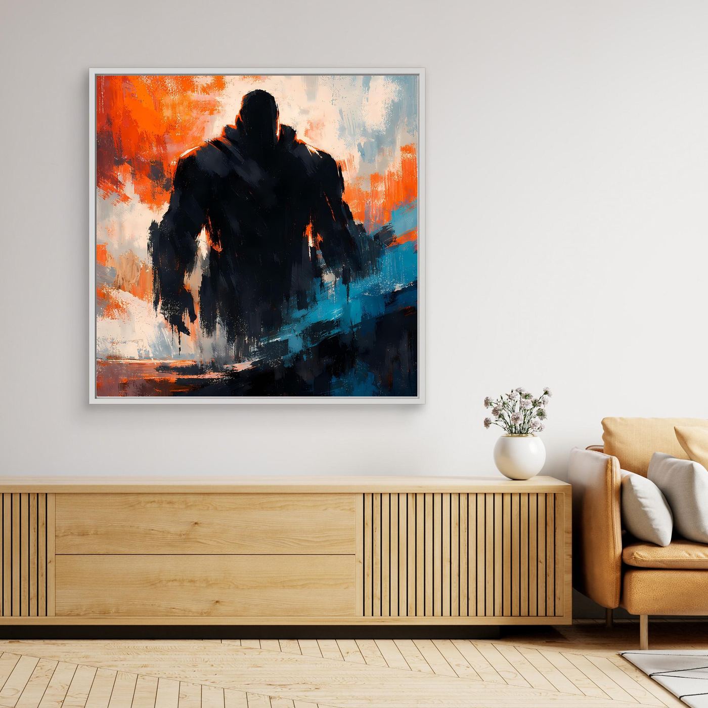 Abstraktes Wandbild mit dunkler Figuren-Silhouette, orange-blauem Farbakzent und hellem Rahmen