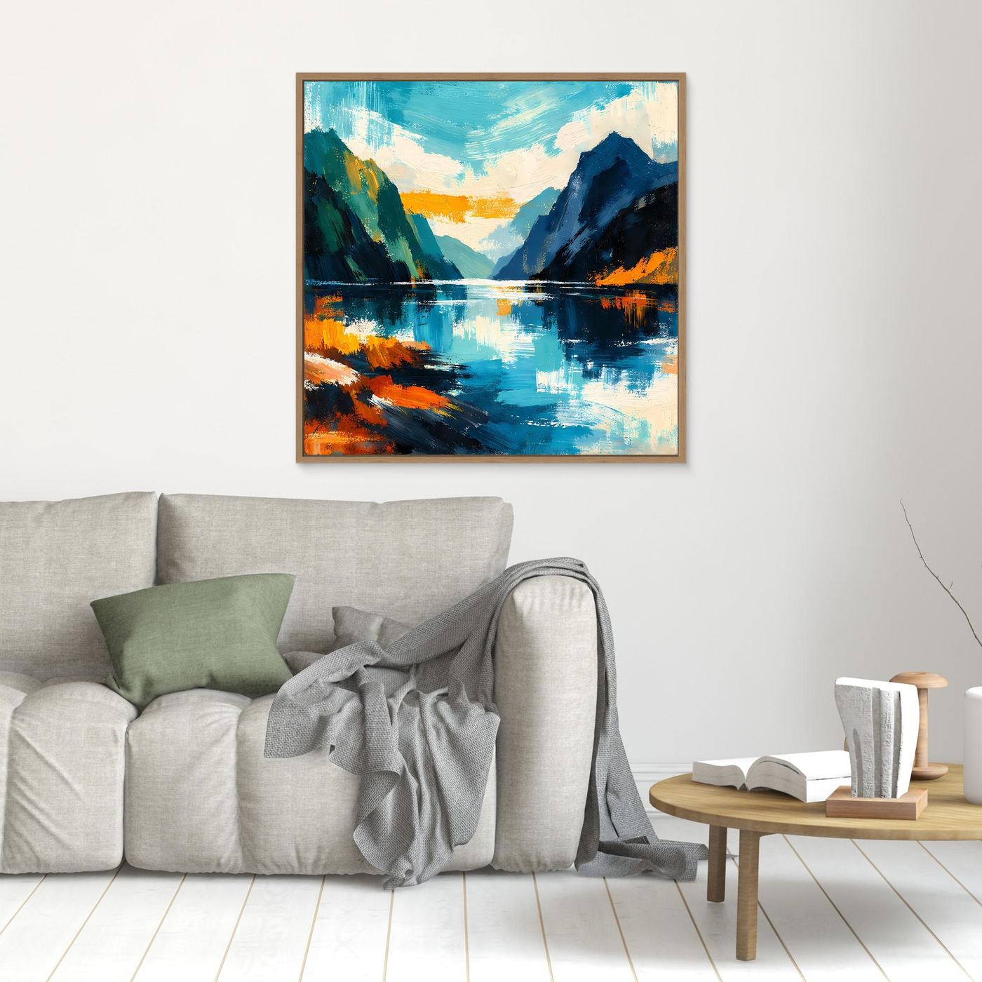 Kleines abstraktes Fjord-Wandbild in türkis, blau und orange mit hellem Holzrahmen