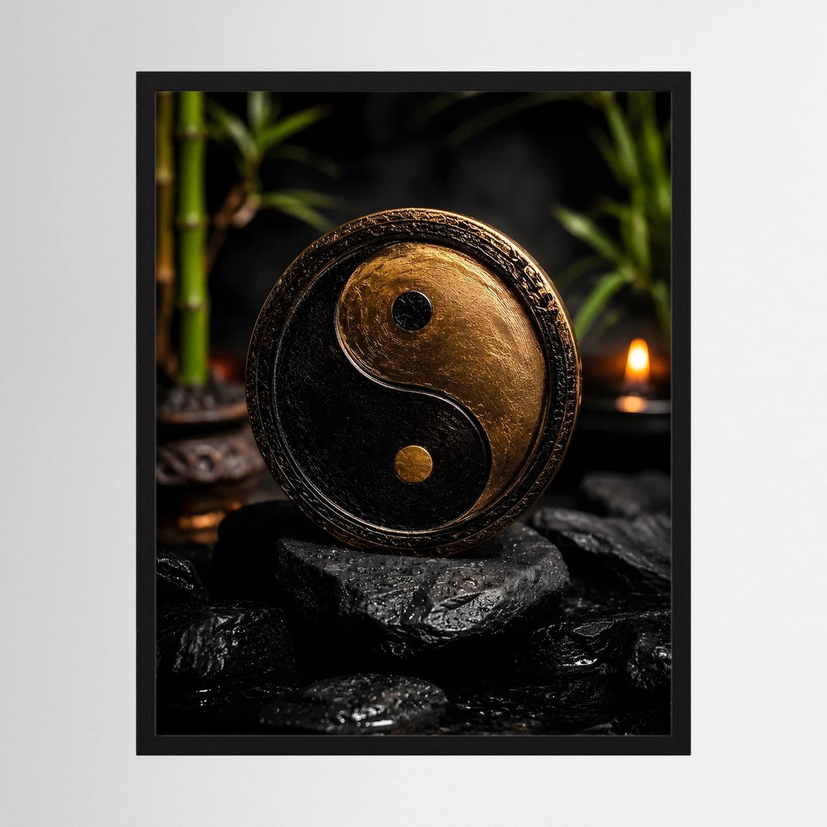 Hochformatiges Yin-Yang-Wandbild im schwarzen Rahmen mit gold-schwarzem Symbol auf Steinen