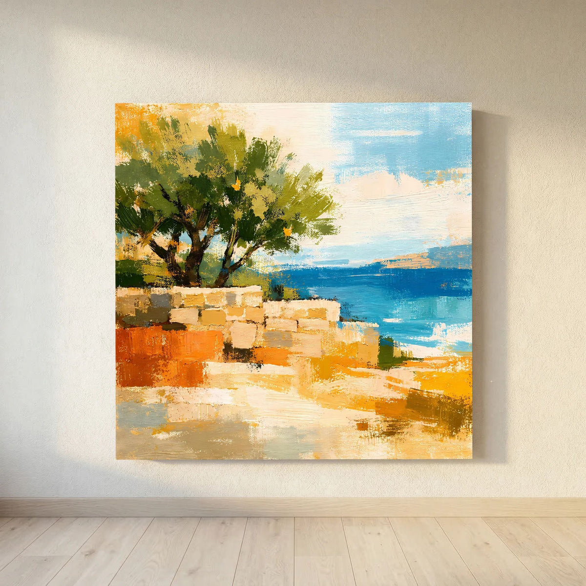 Quadratisches Leinwand-Wandbild mit grünem Baum und orangebraunen Flächen am Küstenrand, blaues Meer.