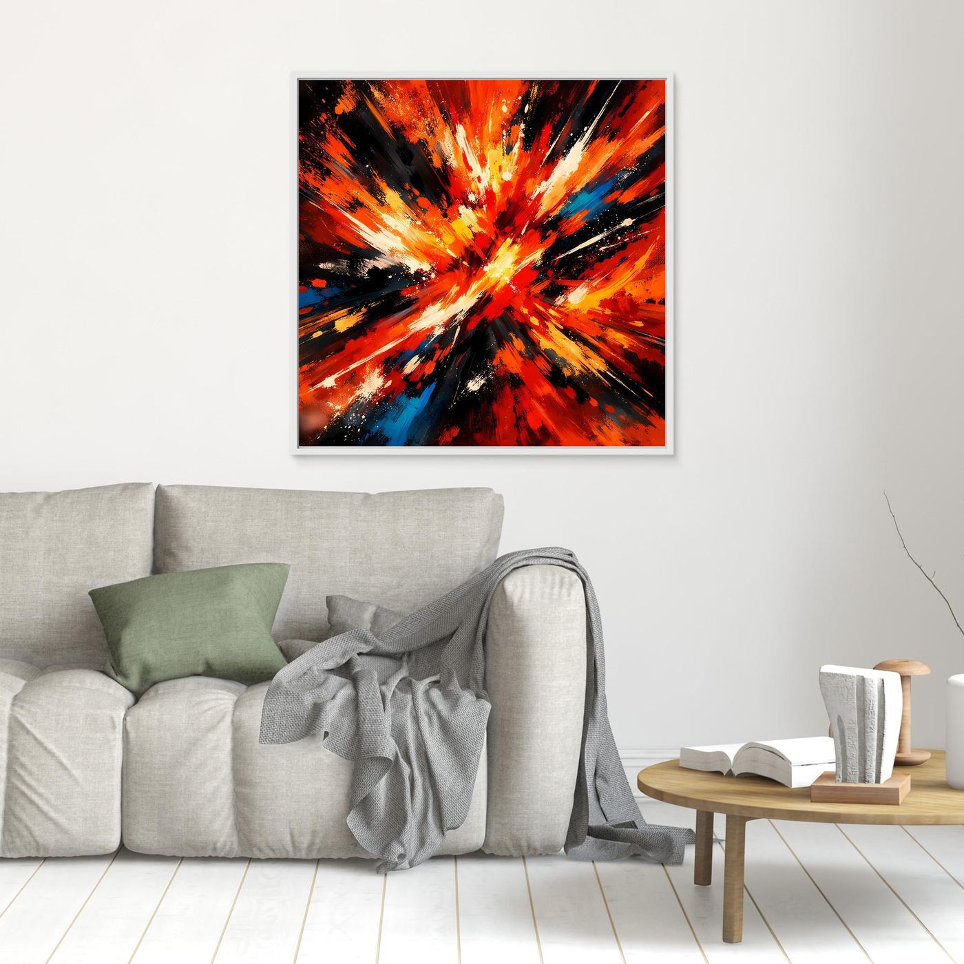 Abstraktes Leinwandbild mit Farbexplosion in Orange, Rot und schwarzen Strahlen, mit dünnem Rahmen.