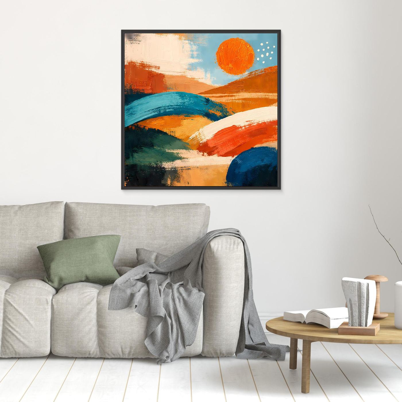 Small framed canvas wall art with dark border, abstract orange and blue hills and sun