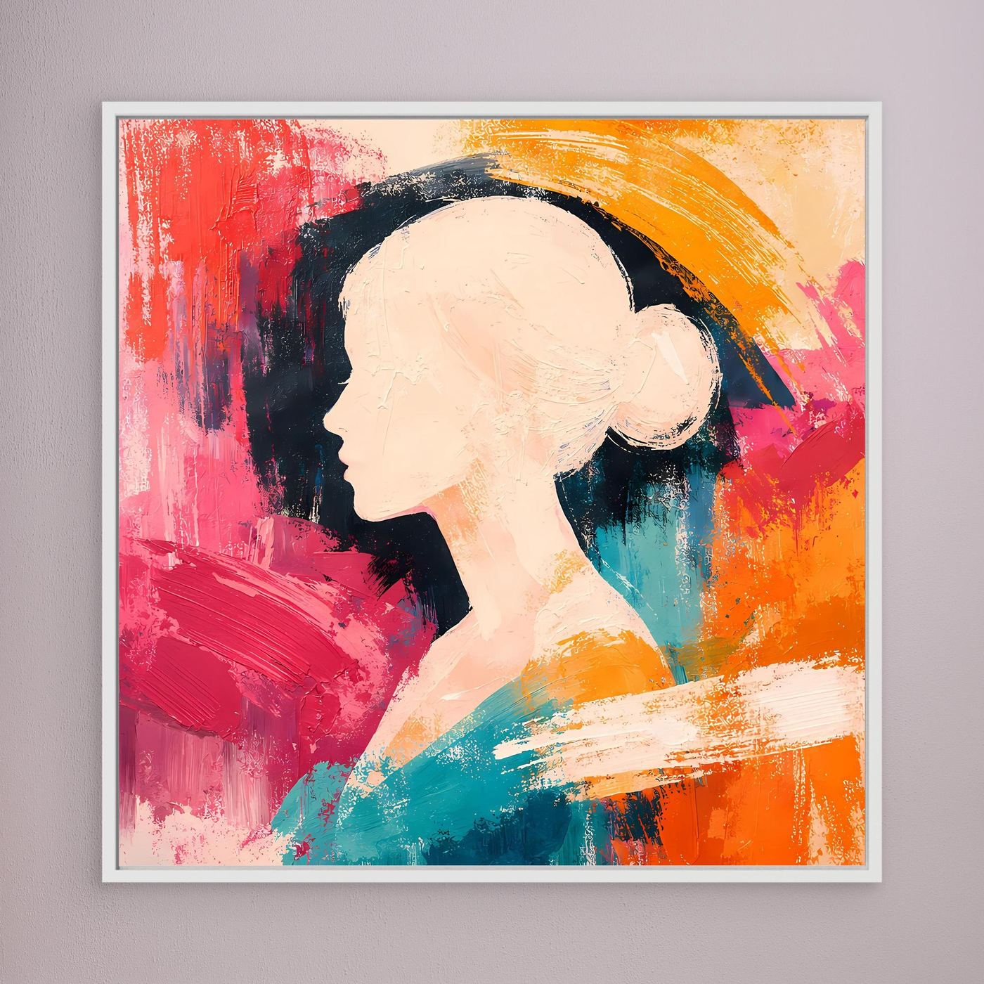 White-framed canvas wall art of a woman profile silhouette with colorful abstract brushstrokes.