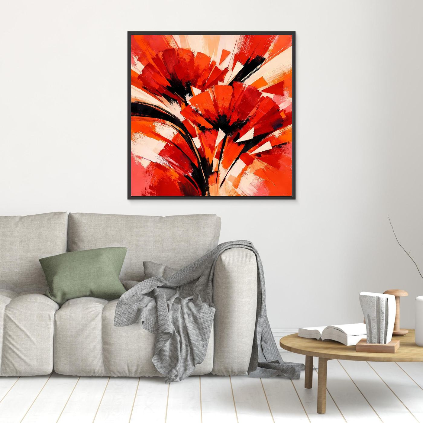 Abstraktes Mohn-Leinwandbild in Rot und Orange, schwarzer Rahmen im Wohnraum
