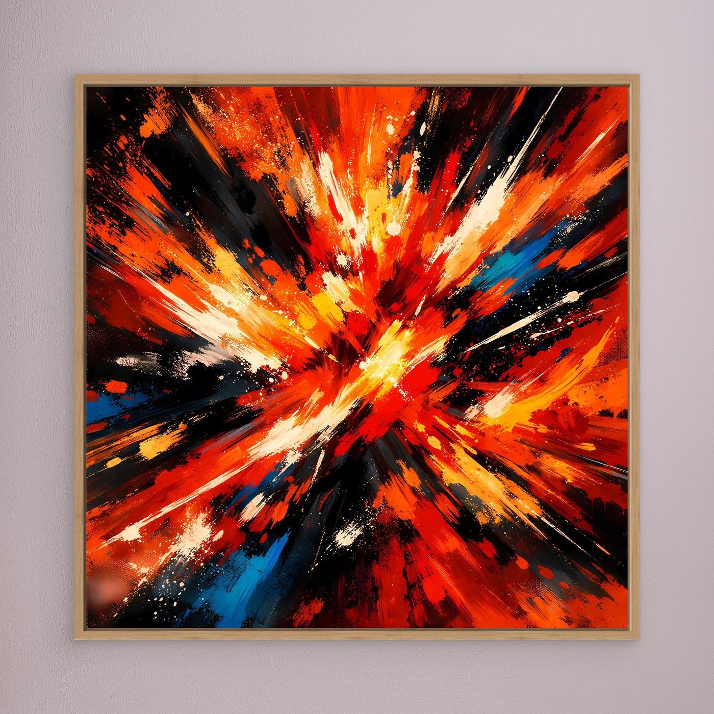 Abstraktes Leinwandbild mit Farbexplosion in Orange, Rot, Gelb und schwarzen Strahlen im beigen Holzrahmen.