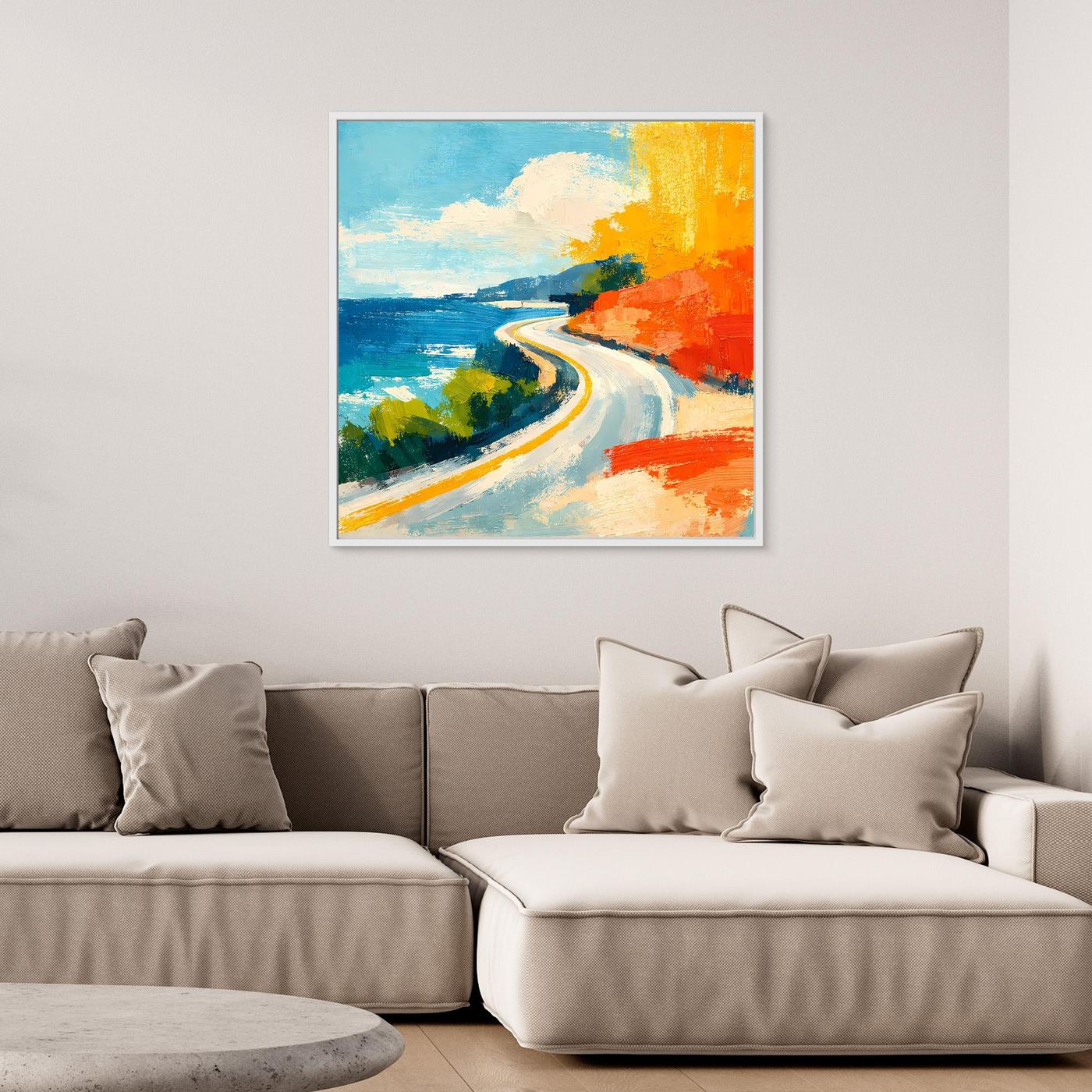 Coastal road abstract wall art with light frame, blue water and orange coast with winding road.