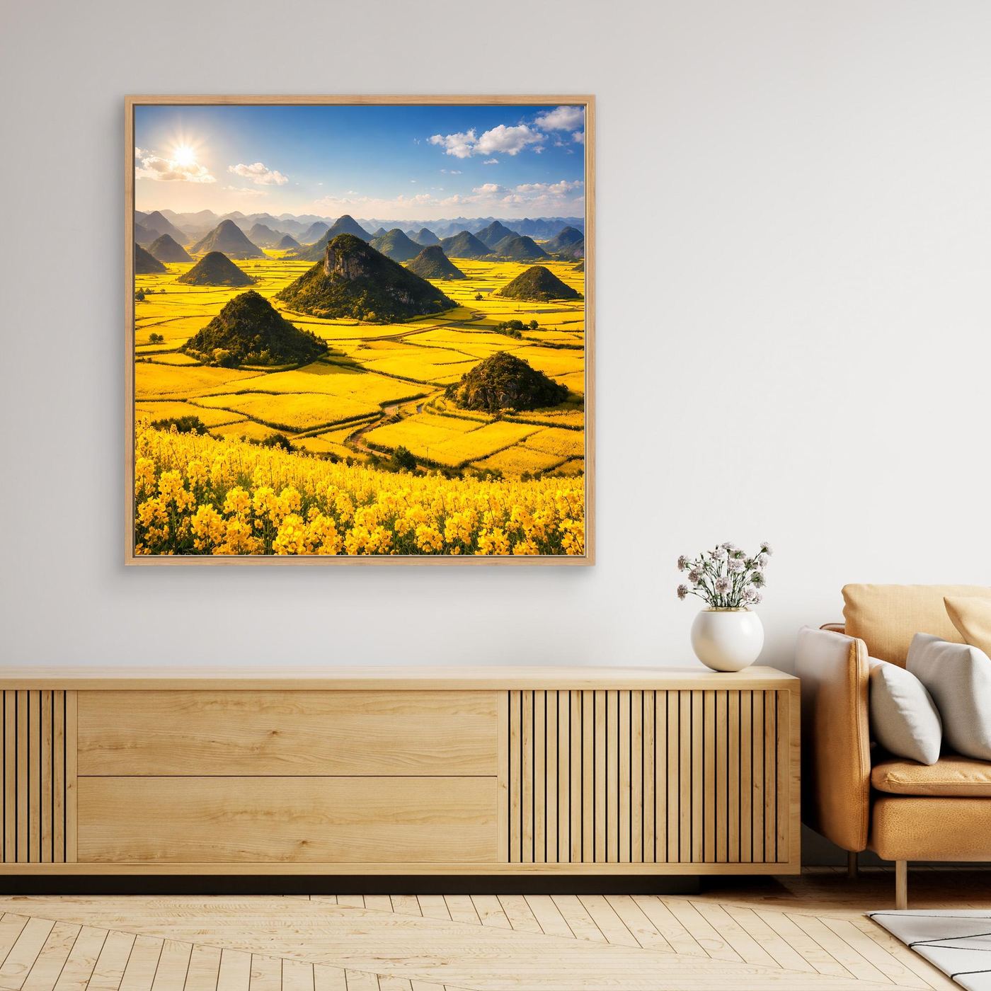 Leinwandbild mit goldenem Rapsfeld und Karstbergen im Eichenrahmen