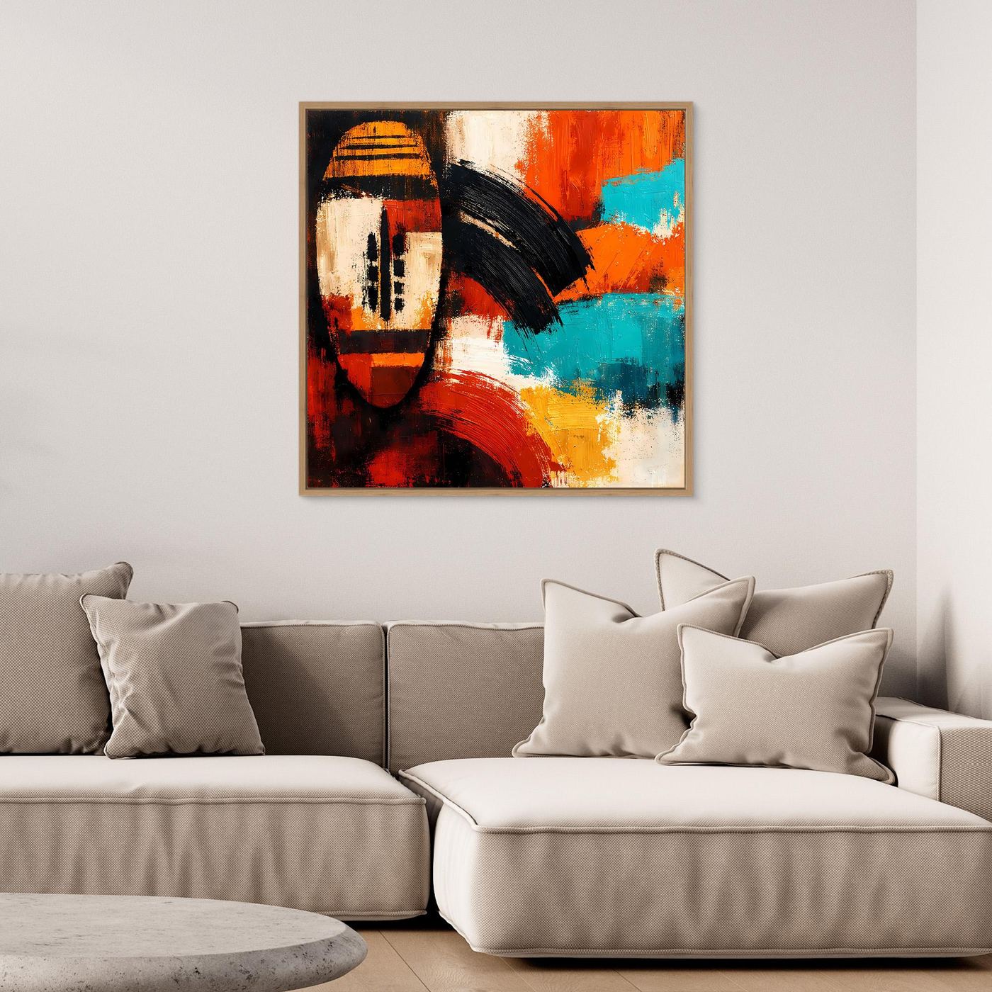 Framed abstract mask wall art featuring orange, turquoise, black and cream brushstrokes