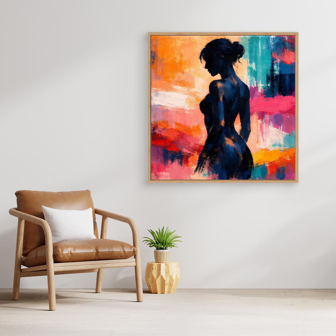 Gerahmtes Leinwand-Wandbild mit abstrakter Frauensilhouette in Blau, Orange, Türkis und Pink.