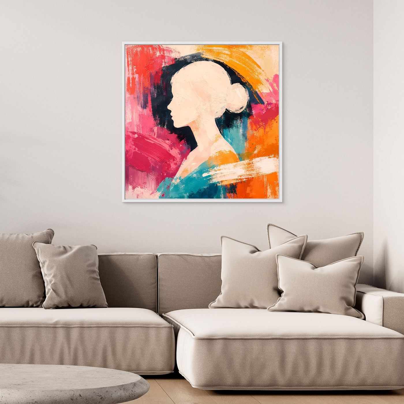 Abstract canvas wall art with woman silhouette in bright red, orange, teal, and pink, with white frame.