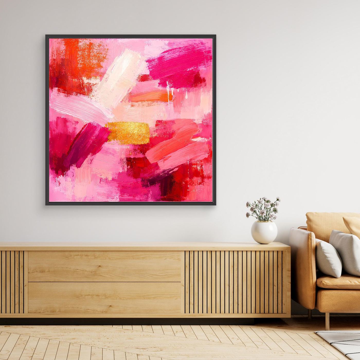 Black-framed abstract wall art with pink, rose, red brushstrokes and gold accents