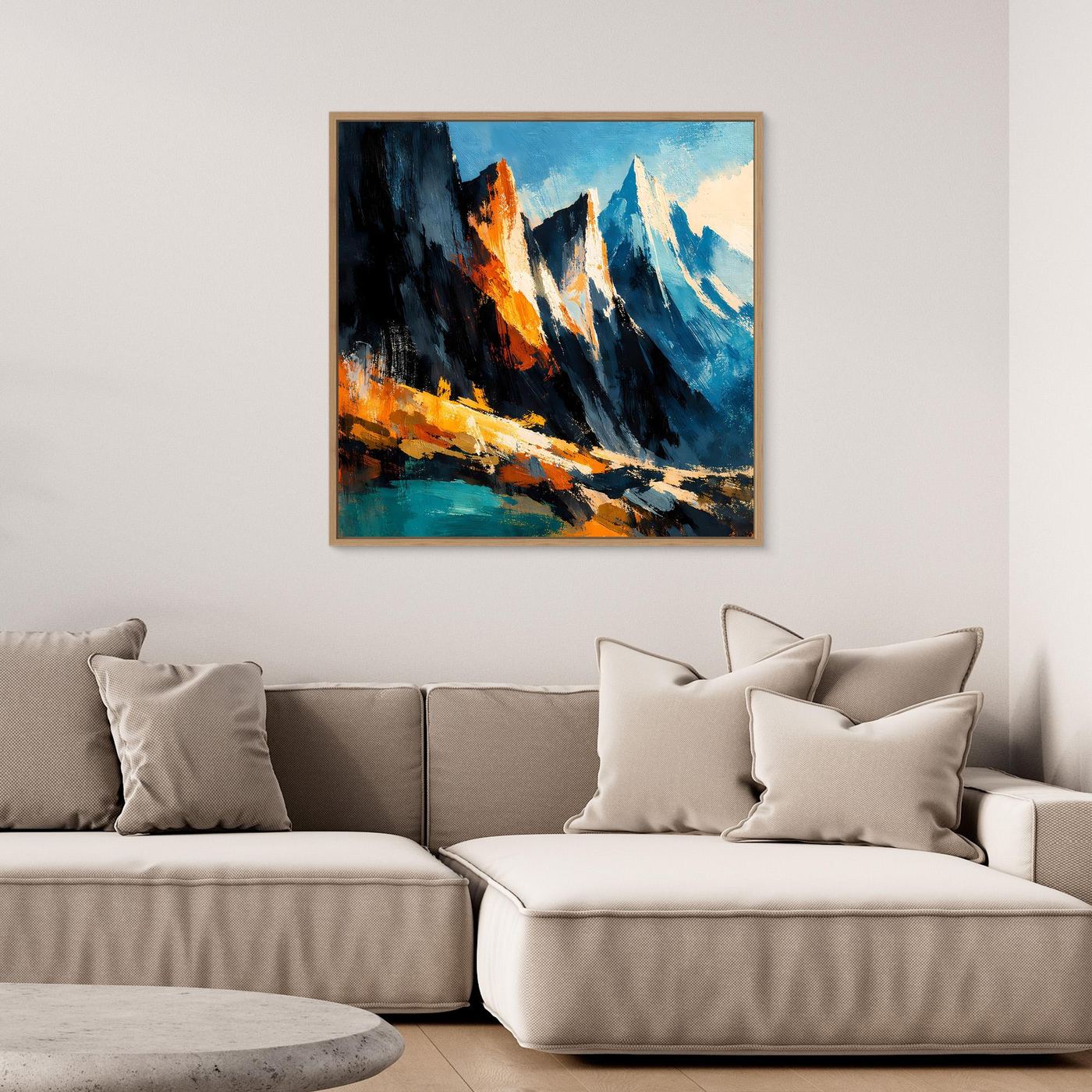 Abstraktes Wandbild mit Bergspitzen in Blau/Türkis, orange Akzente, mit schwarzem Rahmen
