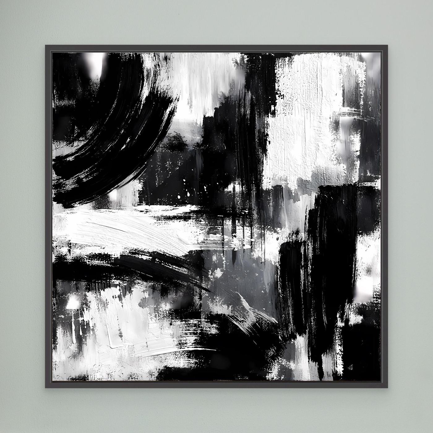 Framed abstract black-and-white canvas with bold brushstrokes, drips, and smudges
