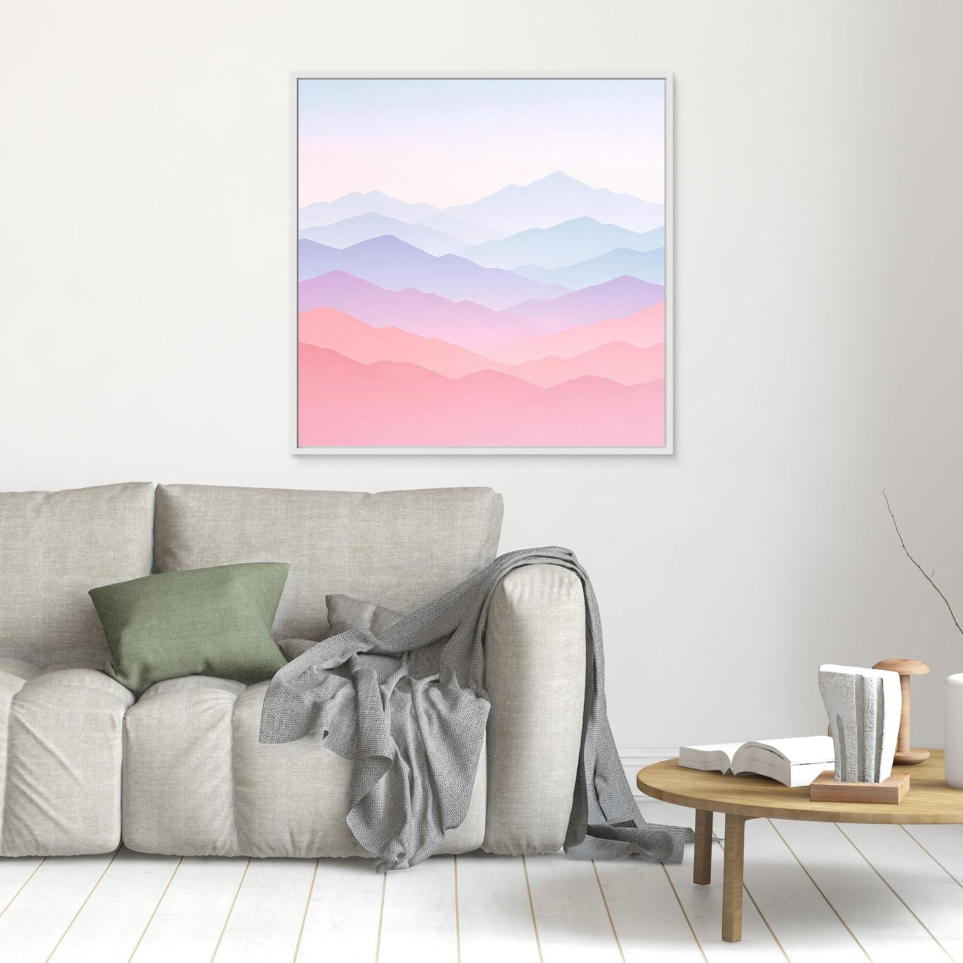 Leinwandbild mit hellem Rahmen, Bergsilhouetten in Pastell-Rosa und Blau