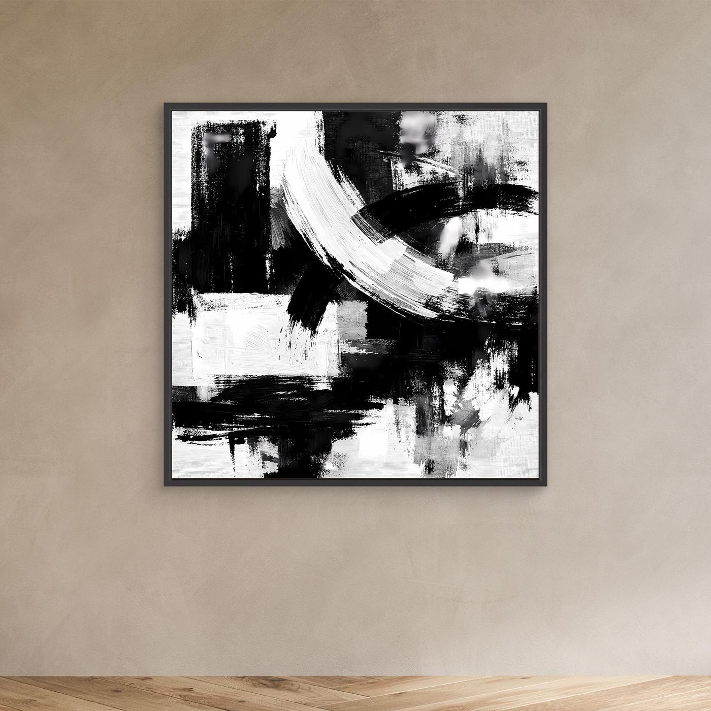 Black-and-white abstract brushstroke canvas wall art in black frame on wall, minimalist