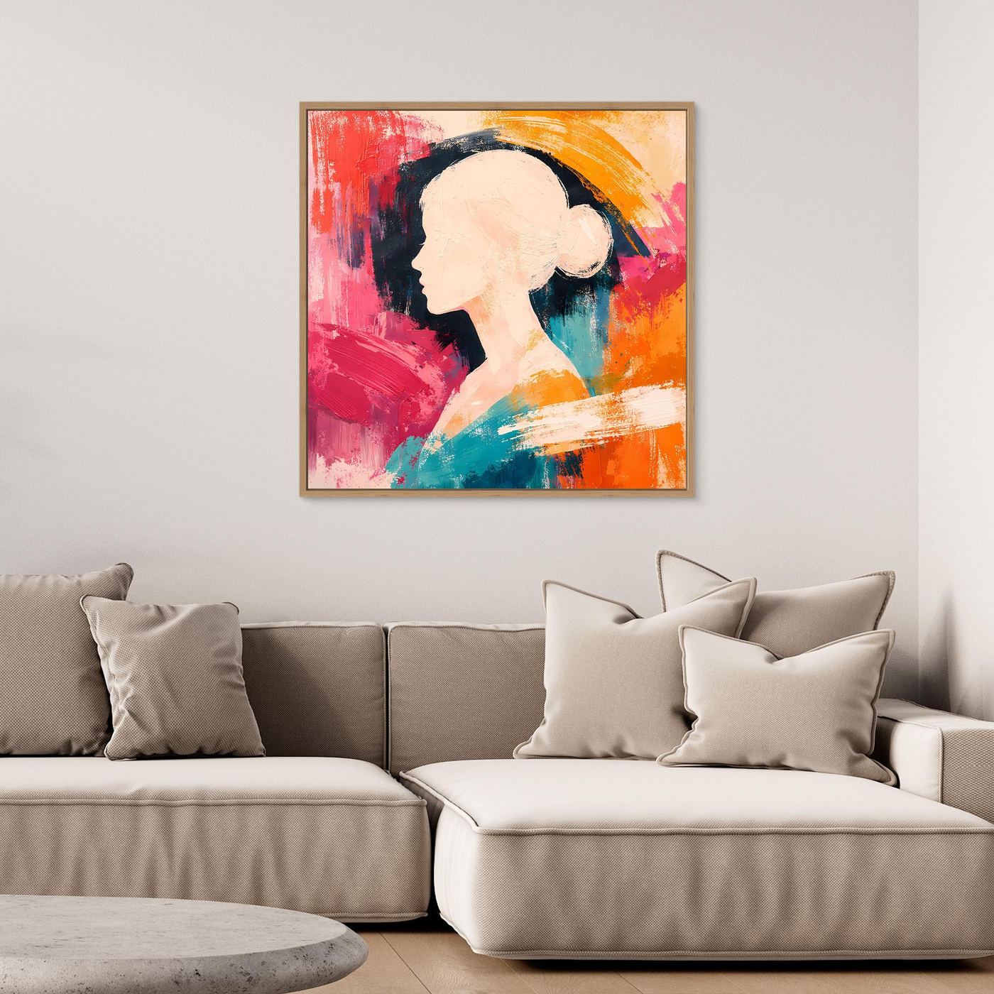Abstract canvas wall art with woman silhouette, red and orange paint, in a gold frame.