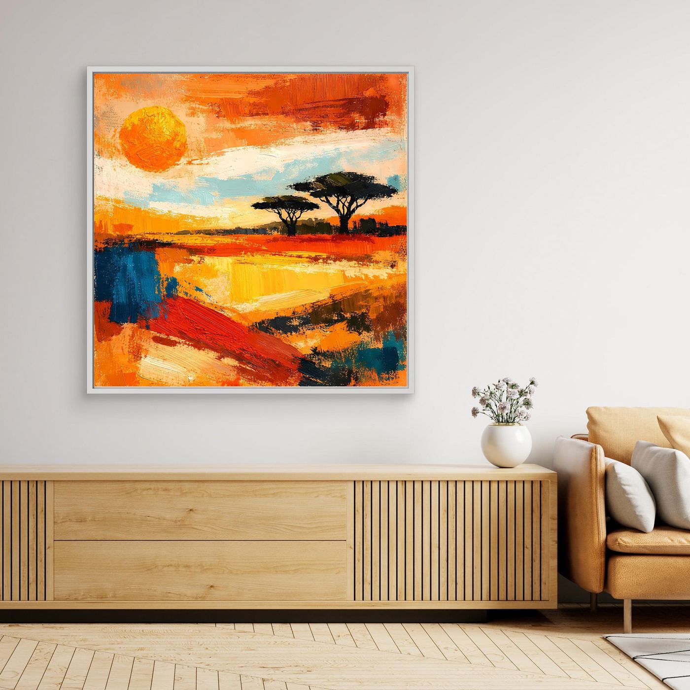 Abstract savanna wall art with orange sun, silhouette trees, and warm textured sky, light frame.
