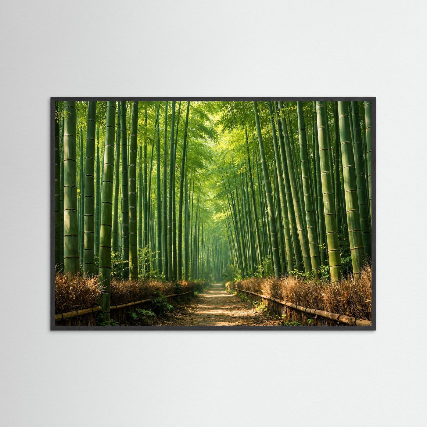 Wandbild mit Bambuswald und Pfad, grüne Stämme, schwarzer Rahmen